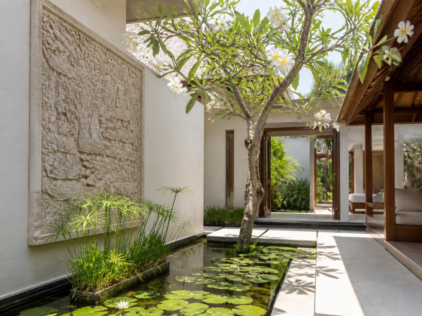 Bright Balinese interior in stone, teak and natural textiles